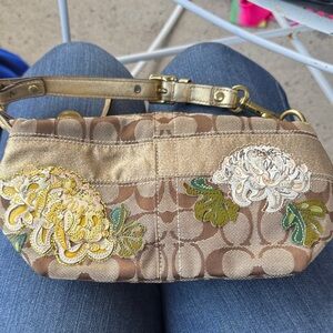 Coach Tan and Gold Floral Wristlet